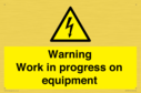 warning-work-in-progress-on-equipmentwith-electrical-hazard-symbol~